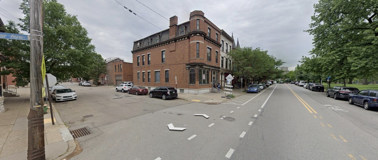 Robby crossing Suisman St on Cedar Ave